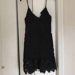 Black mini dress with floral details, size 4